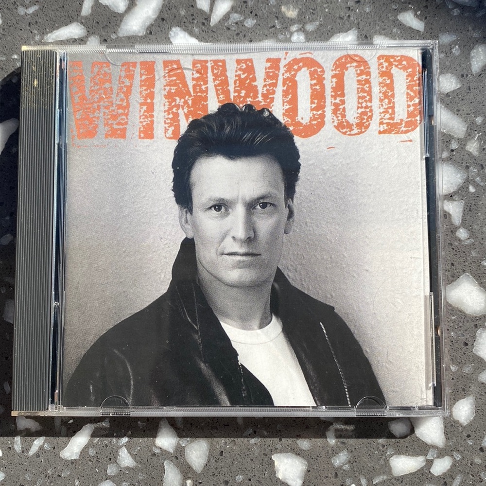Winewood Roll with it album